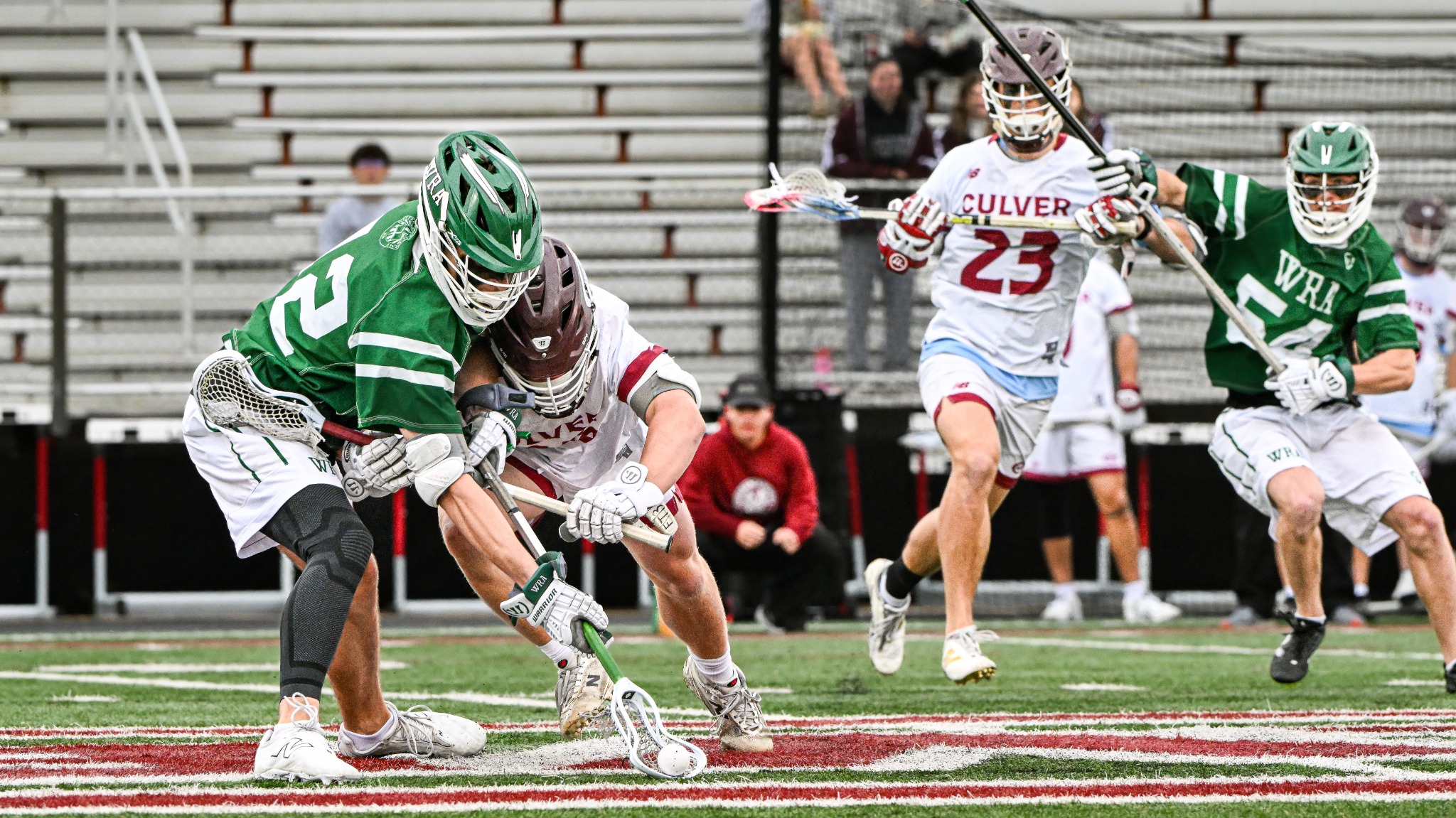 Western Reserve Academy and Culver players competing for a ground ball